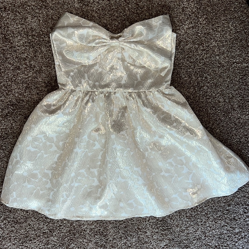 Strapless metallic bow dress